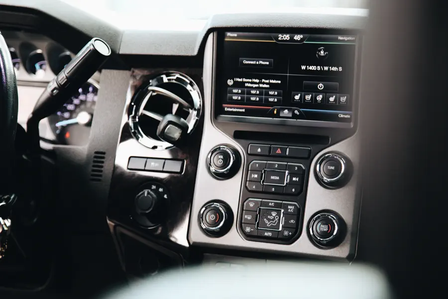 Upgraded touchscreen head unit in a Ford Super Duty dash